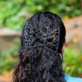 comfy comb wearing by woman with curly hair